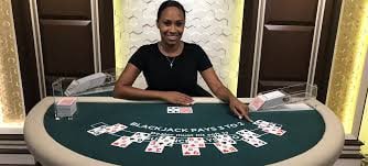 Dealer profesional di studio Live Game Shows 1win online menyiarkan permainan kasino langsung